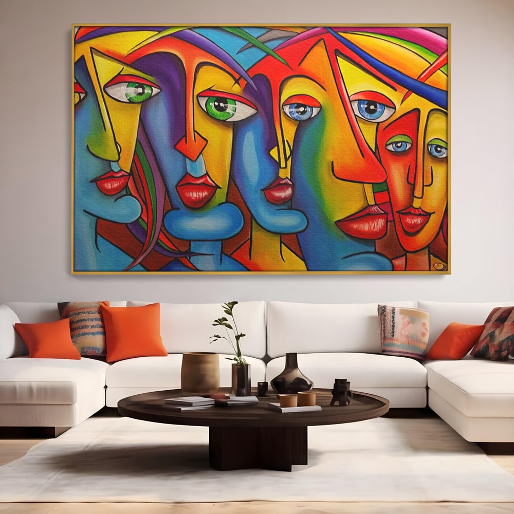 Tablou canvas cu tablou canvas cu fete abstracte colorate, in rama de aluminiu auriu, pe perete intr-un living